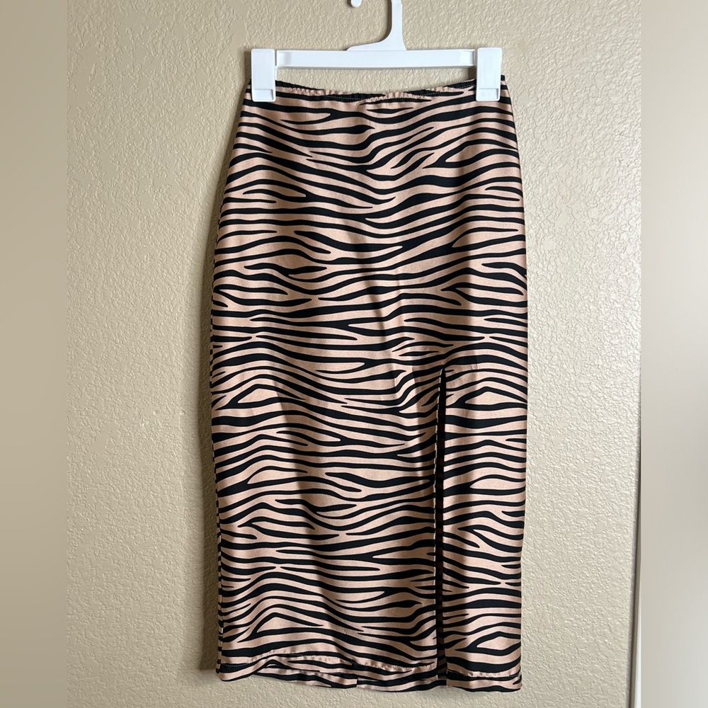 High slit, high fashion silky feeling skirt.